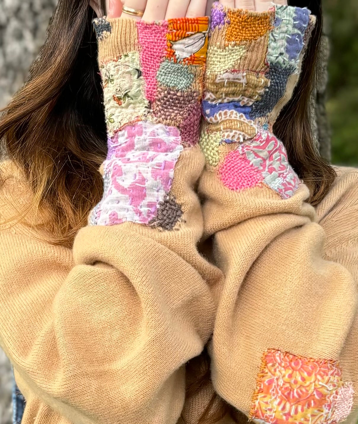 Peculiarly Patched Sweater